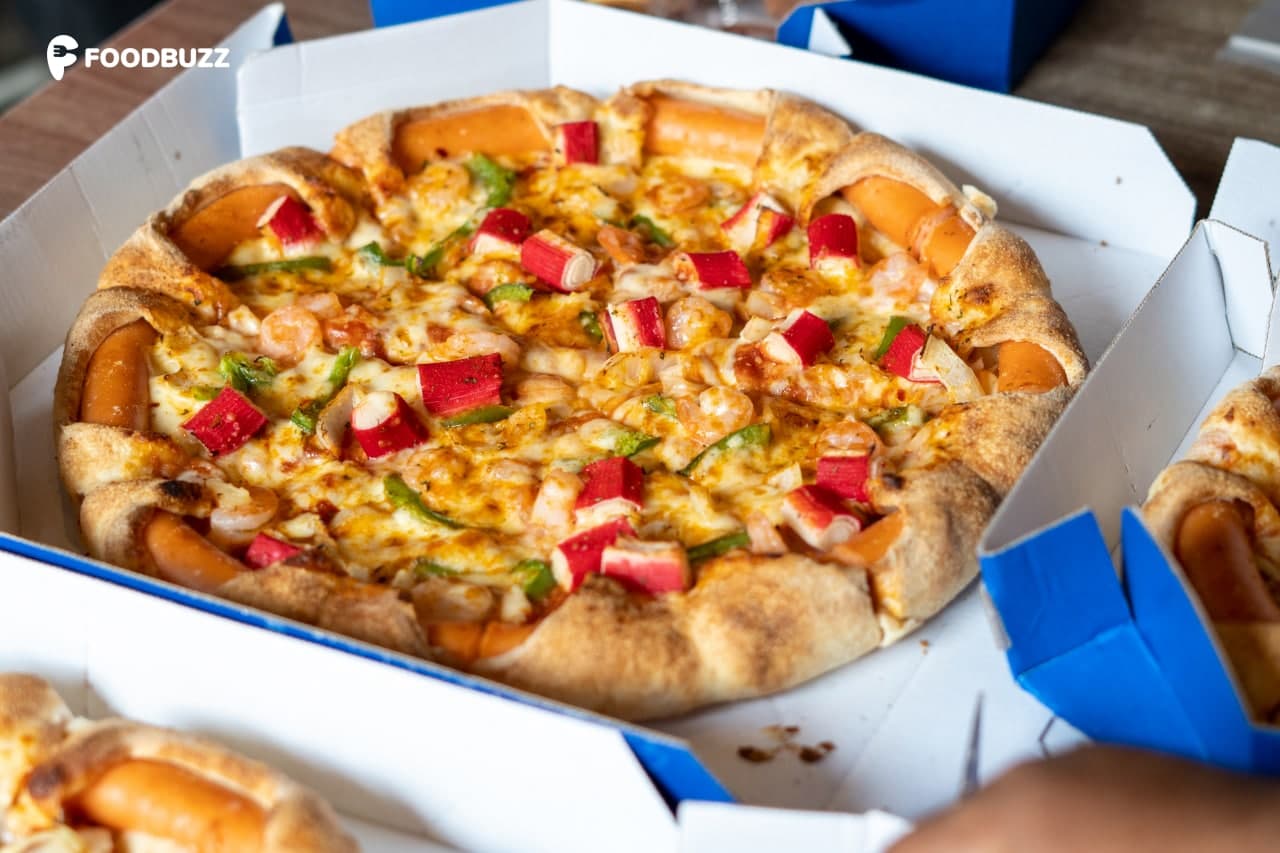 Cheesy Jumbo Sausage The new crust from Domino's Pizza with juicy and tender sausages all over