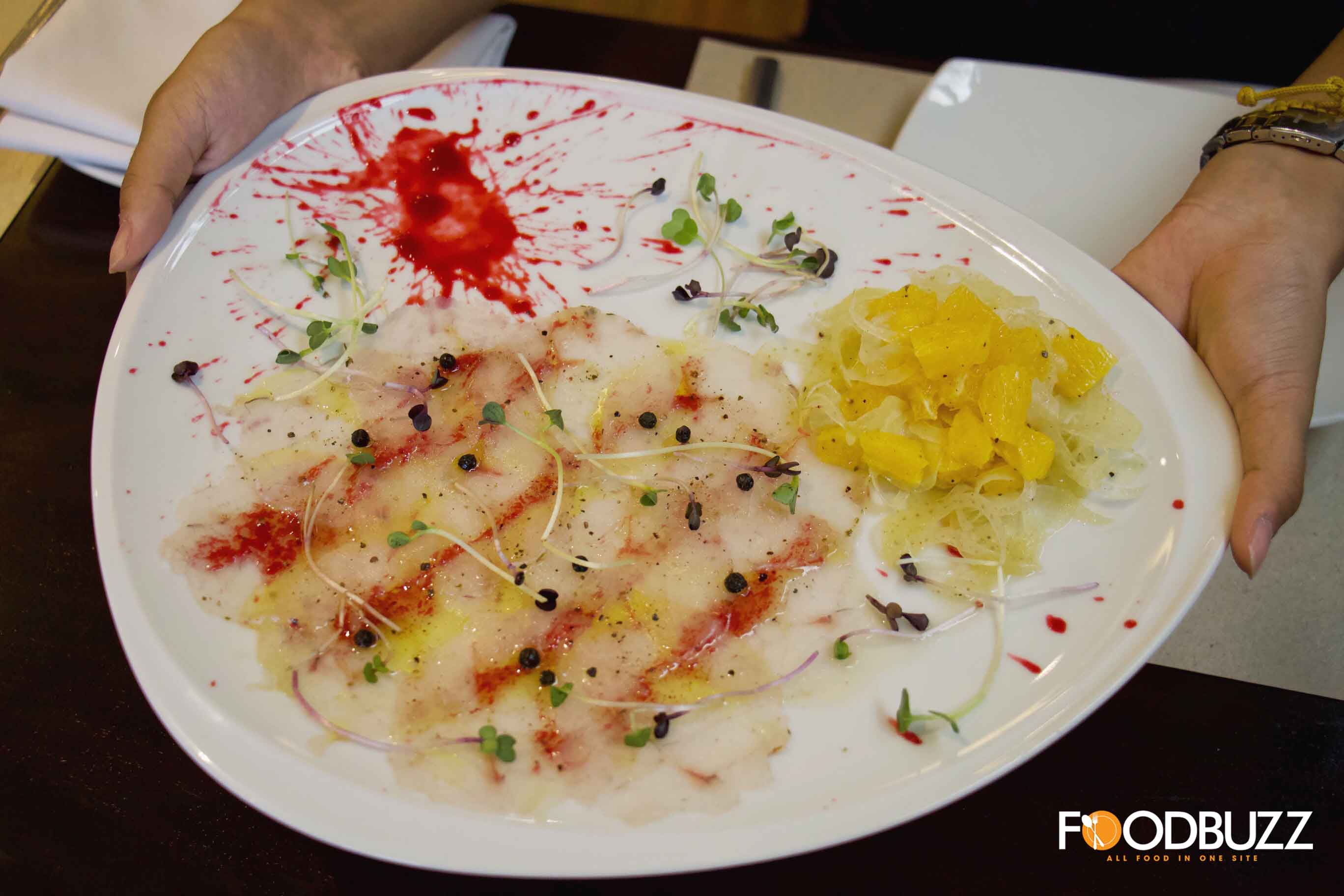 Carpaccio di branzino con agrumi e finocchio