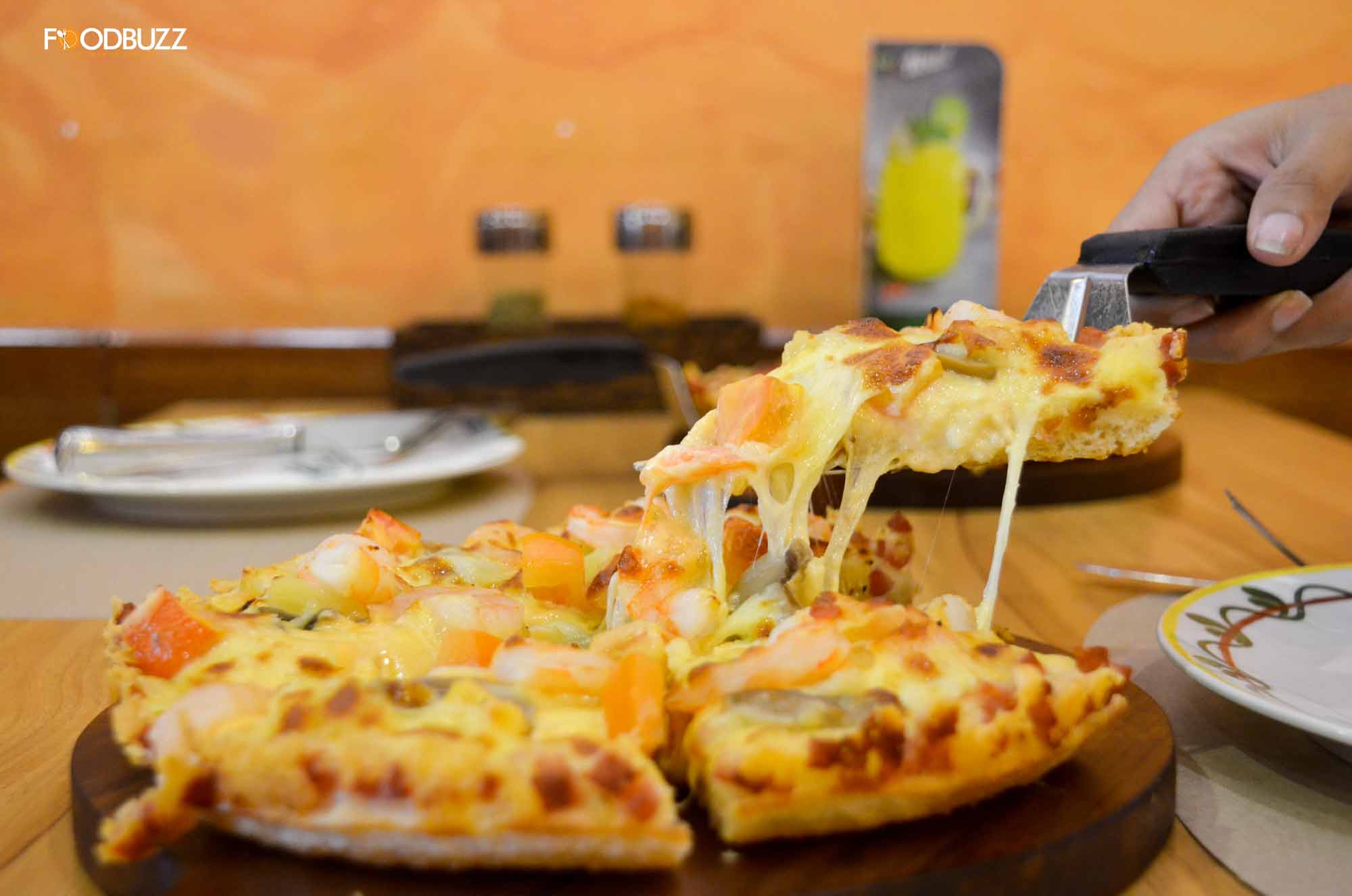 the melty and gooey cheese on the pizza will melt your heart.